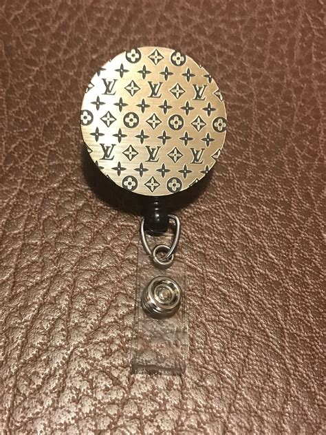 louis vuitton badge reel|louis vuitton key holder.